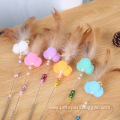 Colorful feather plush ball spring bell cat teaser